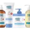 Dr. Eddie's Happy Cappy 3-step set grouped together, two pump bottles, a cream jar and a cream tube