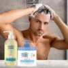 Man washing his hair in the shower with Happy Cappy daily wash and moisturizing cream shown