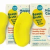 2 yellow Happy Cappy Beanie Brushes with their retail boxes on an opaque white background.